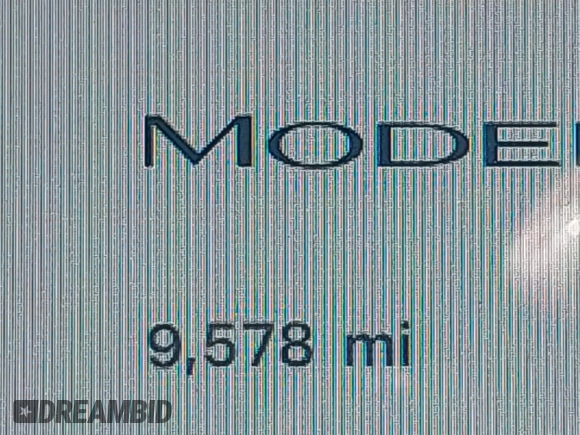 2023 Tesla Model 3 with VIN 5YJ3E1EA3PF617460, listed as a IAAI auction lot 42154401 with 9,578 mi miles and . Bid and sale history available at DreamBid. Image 14.
