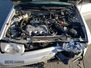 1995 Ford Escort z VIN 3FASP13J0SR159107, wystawiony jako Copart lot #76715394 z przebiegiem 353 430 mil mil oraz Szkody całkowita. Historia ofert i sprzedaży dostępna na DreamBid. Obrazek 11.