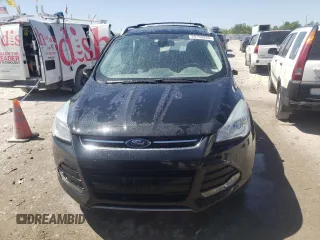 2015 Ford Escape Titanium с VIN 1FMCU0JX9FUB61747, выставлен на аукционе Copart как лот 50790033 с пробегом 146 426 миль миль и Списание • Salvage title. История ставок и продаж доступна на DreamBid. Изображение 5.