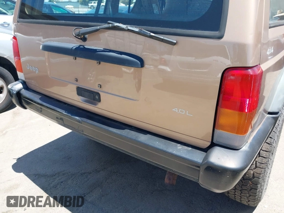 1999 Jeep Cherokee SE with VIN 1J4FF28S4XL592788, listed as a IAAI auction lot 42560002 with 189,258 mi miles and . Bid and sale history available at DreamBid. Image 14.