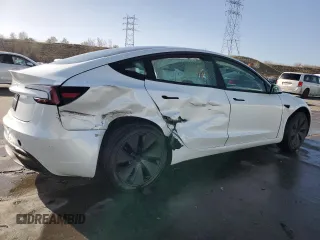 2025 Tesla Model 3 Long Range with VIN 5YJ3E1EAXSF935004, listed as a Copart auction lot 52233195 with 5,873 mi miles and Salvage Title. Bid and sale history available at carsss.com. Image 3.