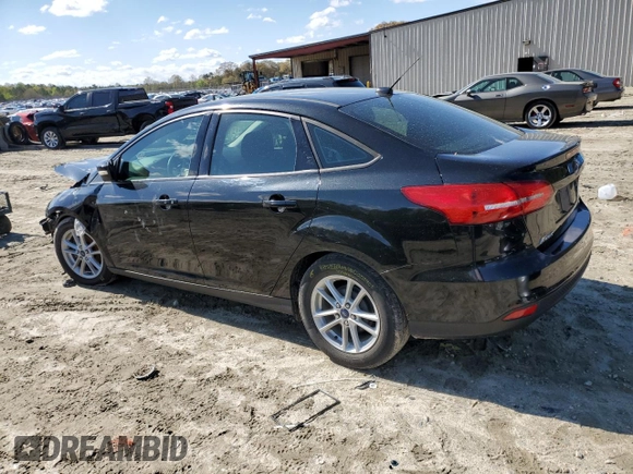 2015 Ford Focus SE with VIN 1FADP3F26FL228606, listed as a Copart auction lot 52525445 with 37,477 mi miles and Salvage Title. Bid and sale history available at DreamBid. Image 2.