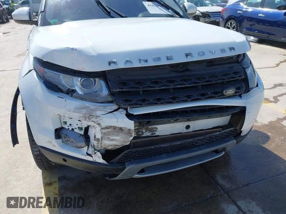 2015 Land Rover Range Rover Evoque Pure with VIN SALVN2BG2FH073984, listed as a IAAI auction lot 41820047 with 75,318 mi miles. Bid and sale history available at carsss.com. Image 18.