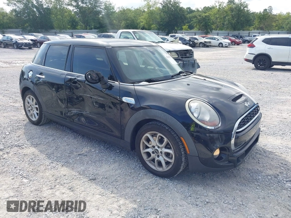 2016 MINI Hardtop 4 Door S z VIN WMWXU3C53G2D30807, wystawiony jako IAAI lot #42545577 z przebiegiem 86 952 mil mil oraz . Historia ofert i sprzedaży dostępna na DreamBid. Obrazek 1.