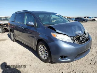 2014 Toyota Sienna XLE with VIN 5TDYK3DC5ES467244, listed as a Copart auction lot 54777445 with 157,503 mi miles and Salvage Title. Bid and sale history available at DreamBid. Image 4.