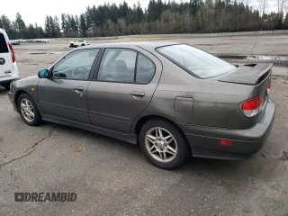 2000 Infiniti G20 Luxury z VIN JNKCP11A5YT303404, wystawiony jako Copart lot #82801234 z przebiegiem 178 185 mil mil oraz Tytuł czysty. Historia ofert i sprzedaży dostępna na DreamBid. Obrazek 2.