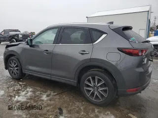 2017 Mazda CX-5 Grand Select with VIN JM3KFADL9H0205417, listed as a Copart auction lot 85123264 with 132,383 mi miles and Salvage Title. Bid and sale history available at carsss.com. Image 2.
