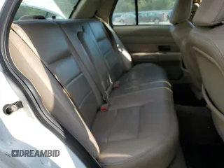 2003 Ford Crown Victoria LX z VIN 2FAFP74W03X209148, wystawiony jako Copart lot #53274575 z przebiegiem 127 739 mil mil oraz Szkody całkowita. Historia ofert i sprzedaży dostępna na DreamBid. Obrazek 10.