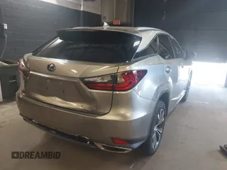 2020 Lexus RX 350 with VIN 2T2HZMDA0LC241565, listed as a IAAI auction lot 42556825 with 48,840 mi miles and . Bid and sale history available at DreamBid. Image 4.