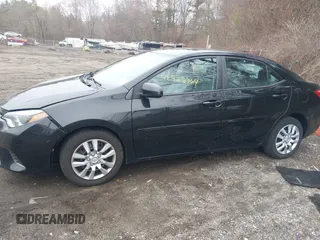 2015 Toyota Corolla L with VIN 2T1BURHEXFC292580, listed as a IAAI auction lot 41922364 with 165,143 mi miles and . Bid and sale history available at DreamBid. Image 14.