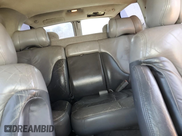 1999 GMC Denali z VIN 1GKEK13R6XR914411, wystawiony jako Copart lot #56063555 z przebiegiem 231 344 mil mil oraz Szkoda całkowita • Salvage title. Historia ofert i sprzedaży dostępna na DreamBid. Obrazek 10.