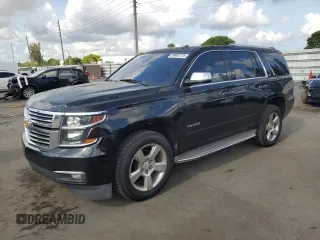 2015 Chevrolet Tahoe LTZ z VIN 1GNSCCKC5FR240584, wystawiony jako Copart lot #59682115 z przebiegiem 208 690 mil mil oraz Czysty tytuł • Clean title. Historia ofert i sprzedaży dostępna na DreamBid. Obrazek 1.