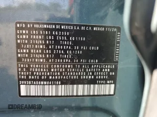2021 Volkswagen Tiguan SE z VIN 3VV3B7AX6MM041166, wystawiony jako Copart lot #57769445 z przebiegiem 51 030 mil mil oraz Nie do naprawy • Non repairable. Historia ofert i sprzedaży dostępna na DreamBid. Obrazek 13.