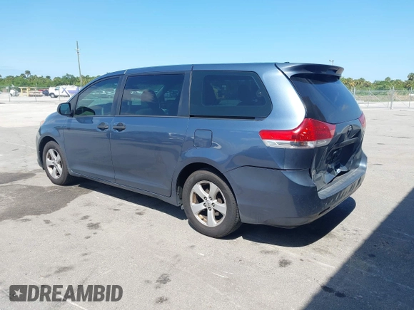 2014 Toyota Sienna L with VIN 5TDZK3DC2ES493997, listed as a IAAI auction lot 41996586 with 192,297 mi miles. Bid and sale history available at carsss.com. Image 3.