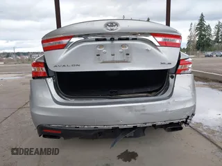 2014 Toyota Avalon Limited with VIN 4T1BK1EB3EU104576, listed as a IAAI auction lot 41773431 with 105,419 mi miles. Bid and sale history available at carsss.com. Image 6.