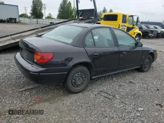 2000 Saturn SL z VIN 1G8ZH528XYZ160128, wystawiony jako Copart lot #64913404 z przebiegiem 172 587 mil mil oraz Czysty tytuł • Clean title. Historia ofert i sprzedaży dostępna na DreamBid. Obrazek 3.
