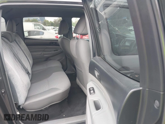 2014 Toyota Tacoma PreRunner with VIN 3TMKU4HN9EM041509, listed as a IAAI auction lot 42441194 with 290,715 mi miles and . Bid and sale history available at DreamBid. Image 8.