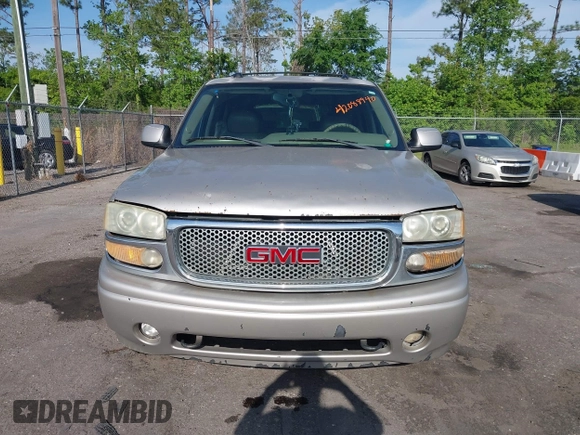 2004 GMC Yukon Denali z VIN 1GKEK63U94J249578, wystawiony jako IAAI lot #42088940 z przebiegiem 253 352 mil mil oraz . Historia ofert i sprzedaży dostępna na DreamBid. Obrazek 6.