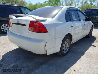 2002 Honda Civic LX with VIN 1HGES165X2L009591, listed as a IAAI auction lot 42048933 with 202,074 mi miles. Bid and sale history available at carsss.com. Image 6.