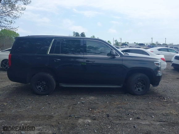 2019 Chevrolet Tahoe Commercial with VIN 1GNLCDECXKR208052, listed as a IAAI auction lot 42014348 with 96,455 mi miles. Bid and sale history available at carsss.com. Image 13.