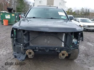 2018 Chevrolet Tahoe LT z VIN 1GNSKBKC7JR276427, wystawiony jako IAAI lot #41977418 z przebiegiem 152 007 mil mil oraz . Historia ofert i sprzedaży dostępna na DreamBid. Obrazek 12.