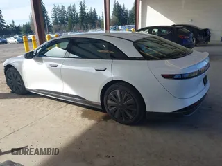 2024 Lucid Air Pure with VIN 50EA1PGA1RA007535, listed as a IAAI auction lot 41879547 with 2,497 mi miles. Bid and sale history available at carsss.com. Image 3.
