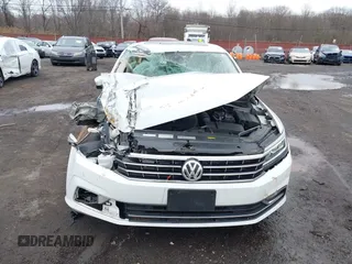 2017 Volkswagen Passat SE z VIN 1VWGT7A35HC052769, wystawiony jako IAAI lot #41687009 z przebiegiem 59 791 mil mil oraz . Historia ofert i sprzedaży dostępna na DreamBid. Obrazek 12.