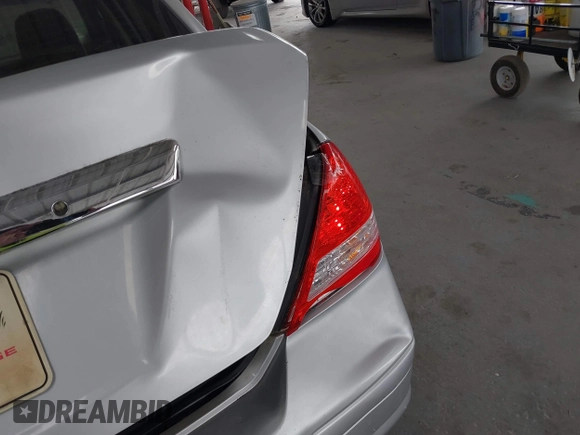 2011 Nissan Versa S with VIN 3N1BC1APXBL460003, listed as a IAAI auction lot 42206242 with 113,099 mi miles and . Bid and sale history available at DreamBid. Image 6.