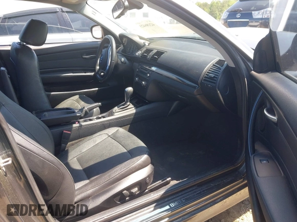 2013 BMW 1 Series 128i with VIN WBAUP7C57DVP25145, listed as a IAAI auction lot 42186423 with 131,222 mi miles and . Bid and sale history available at DreamBid. Image 5.