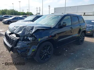 2021 Jeep Grand Cherokee Laredo E with VIN 1C4RJEAG0MC571375, listed as a IAAI auction lot 42087648 with 29,358 mi miles and . Bid and sale history available at DreamBid. Image 18.