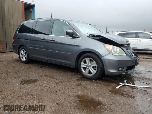 2010 Honda Odyssey Touring с VIN 5FNRL3H92AB114278, выставлен на аукционе Copart как лот 61245465 с пробегом 186 733 миль миль и Чистый • Clean title. История ставок и продаж доступна на DreamBid. Изображение 4.
