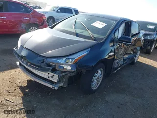 2021 Toyota Prius L Eco with VIN JTDKAMFU1M3134107, listed as a IAAI auction lot 41763080 with 185,248 mi miles. Bid and sale history available at carsss.com. Image 18.