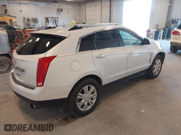 2010 Cadillac SRX Luxury Collection with VIN 3GYFNDEY8AS540220, listed as a IAAI auction lot 42128036 with 185,845 mi miles. Bid and sale history available at carsss.com. Image 4.