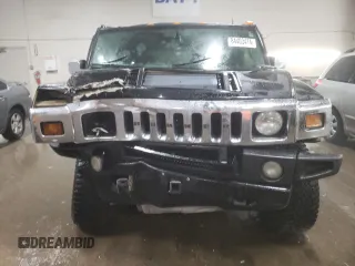 2003 Hummer H2 with VIN 5GRGN23U33H143023, listed as a Copart auction lot 84403414 with 0 mi miles and Salvage Title. Bid and sale history available at carsss.com. Image 5.