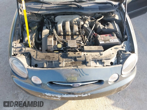 1999 Ford Taurus SE Comfort z VIN 1FAFP53S3XG104165, wystawiony jako IAAI lot #42234147 z przebiegiem 183 124 mil mil oraz . Historia ofert i sprzedaży dostępna na DreamBid. Obrazek 10.