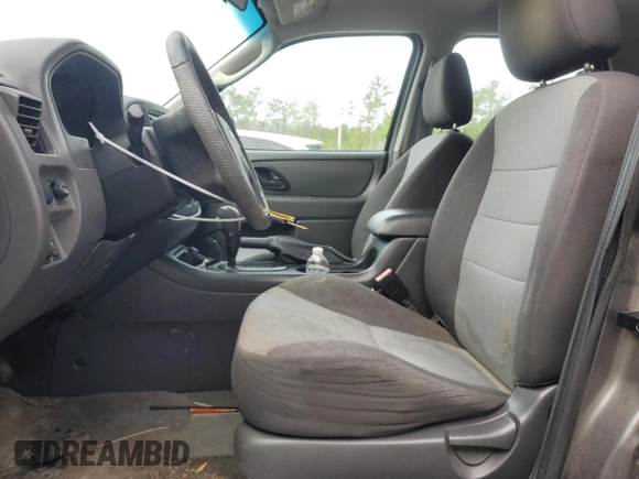 2006 Ford Escape XLS with VIN 1FMYU02Z66KA18952, listed as a Copart auction lot 60472305 with 221,258 mi miles and Salvage title. Bid and sale history available at DreamBid. Image 7.