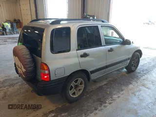2003 Chevrolet Tracker z VIN 2CNBE13C336953203, wystawiony jako IAAI lot #42195810 z przebiegiem 123 503 mil mil oraz . Historia ofert i sprzedaży dostępna na DreamBid. Obrazek 4.