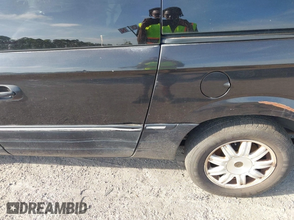 2006 Chrysler Town & Country Touring with VIN 2A8GP54L66R876008, listed as a IAAI auction lot 42496347 with 211,063 mi miles and . Bid and sale history available at DreamBid. Image 12.