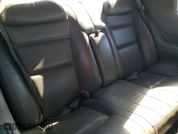 1999 Cadillac Eldorado z VIN 1G6EL12Y0XU604529, wystawiony jako Copart lot #77620004 z przebiegiem 246 032 mil mil oraz Szkoda całkowita • Salvage title. Historia ofert i sprzedaży dostępna na DreamBid. Obrazek 10.