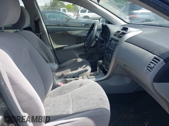 2013 Toyota Corolla L with VIN JTDBU4EE2DJ113876, listed as a IAAI auction lot 42044548 with 232,500 mi miles. Bid and sale history available at carsss.com. Image 5.