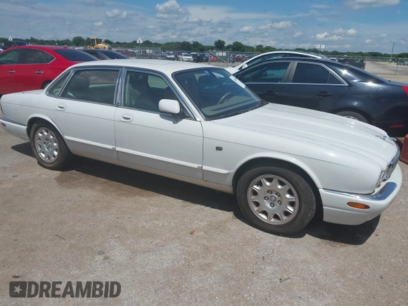 2003 Jaguar XJ 8 with VIN SAJDA14C03LF52338, listed as a IAAI auction lot 42684038 with 142,107 mi miles and . Bid and sale history available at DreamBid. Image 1.