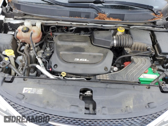 2017 Chrysler Pacifica Touring L with VIN 2C4RC1BG2HR734557, listed as a Copart auction lot 53630065 with 147,955 mi miles and Salvage Title. Bid and sale history available at DreamBid. Image 12.