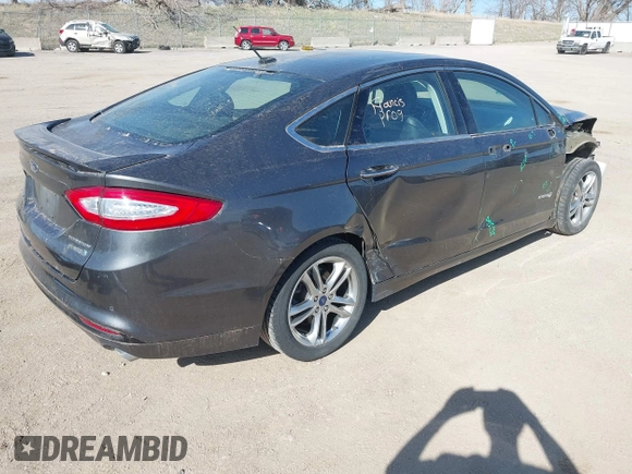 2016 Ford Fusion Titanium Hybrid с VIN 3FA6P0RU8GR266488, выставлен на аукционе IAAI как лот 41903919 с пробегом 74 927 миль миль и . История ставок и продаж доступна на DreamBid. Изображение 4.