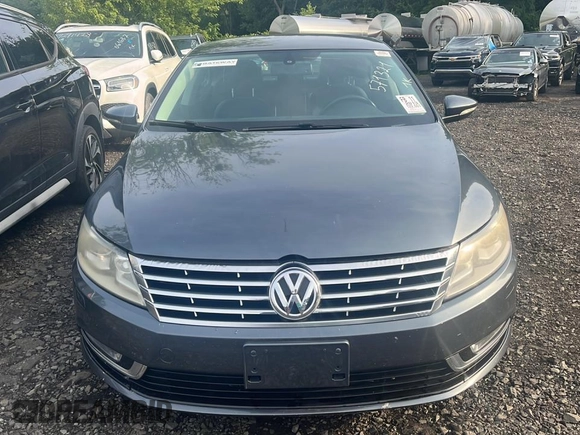 2013 Volkswagen CC R-Line with VIN WVWBP7AN1DE571321, listed as a Copart auction lot 70648784 with 122,061 mi miles and Clean Title. Bid and sale history available at carsss.com. Image 2.