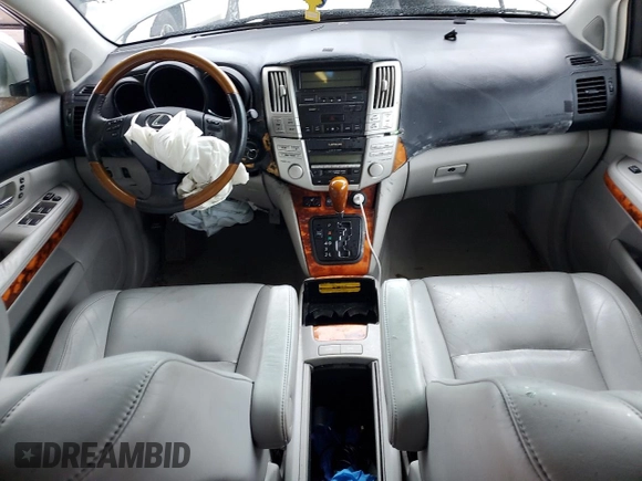 2005 Lexus RX 330 с VIN 2T2GA31U55C027296, выставлен на аукционе Copart как лот 61410205 с пробегом 209 293 миль миль и Списание • Salvage title. История ставок и продаж доступна на DreamBid. Изображение 8.