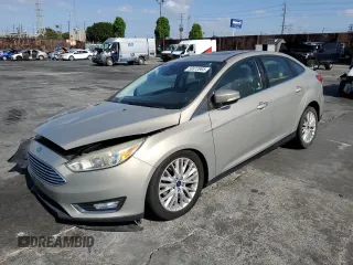 2015 Ford Focus Titanium с VIN 1FADP3J28FL288037, выставлен на аукционе Copart как лот 56972865 с пробегом 75 703 миль миль и Списание • Salvage title. История ставок и продаж доступна на DreamBid. Изображение 1.