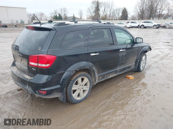 2013 Dodge Journey R/T with VIN 3C4PDDFG7DT724534, listed as a IAAI auction lot 41161346 with 175,606 mi miles and . Bid and sale history available at DreamBid. Image 4.