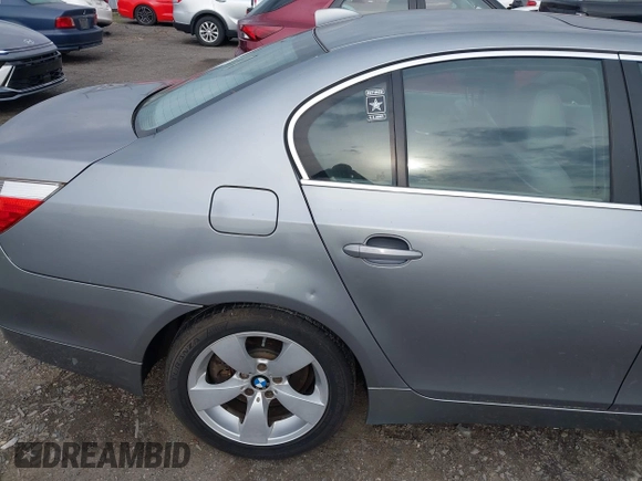 2005 BMW 5 Series 525i with VIN WBANA53535B857896, listed as a IAAI auction lot 42164290 with 207,711 mi miles. Bid and sale history available at carsss.com. Image 6.