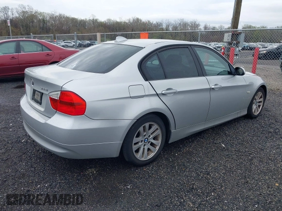 2007 BMW 3 Series 328i with VIN WBAVA33557PG53078, listed as a IAAI auction lot 41936187 with 186,492 mi miles. Bid and sale history available at carsss.com. Image 4.