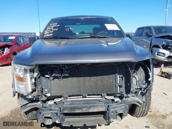 2021 Ford F-150 XL with VIN 1FTEW1CP2MFC27115, listed as a IAAI auction lot 41488090 with 86,880 mi miles. Bid and sale history available at carsss.com. Image 13.